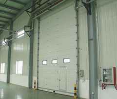 fireproof industrial french sliding sectional garage doors with small door on China WDMA